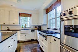 black granite white cabinets Granite kitchen BK&K Affordable Countertops